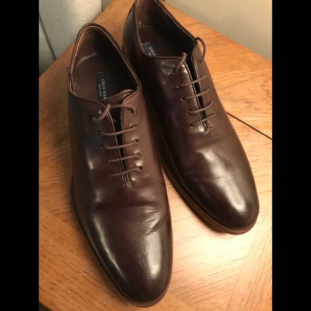 Cole Haan wholecut brown leather oxfords.